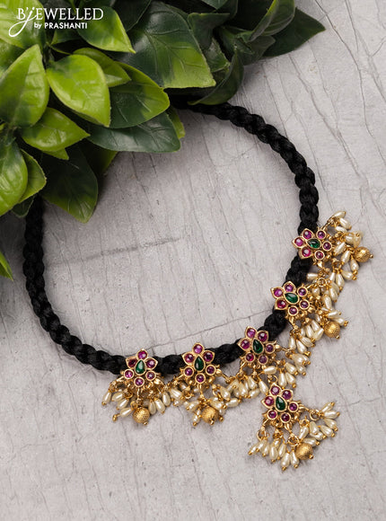 Black thread necklace with kemp stone and pearl hangings without earrings