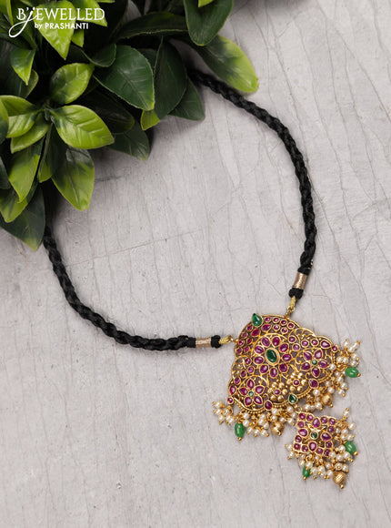 Black thread floral design necklace with kemp stone and pearl hangings without earrings