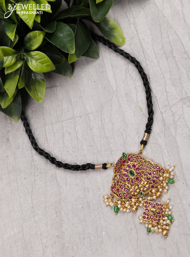 Black thread floral design necklace with kemp stone and pearl hangings without earrings