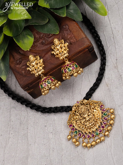 Black thread necklace with kemp stone lakshmi pendant and golden beads hangings