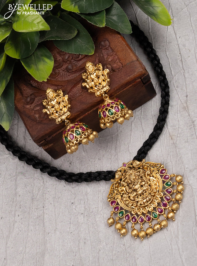 Black thread necklace with kemp stone lakshmi pendant and golden beads hangings