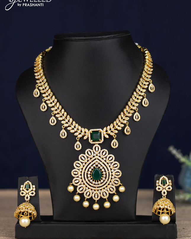 Zircon necklace with emerald & cz stones and pearl hangings in gold finish