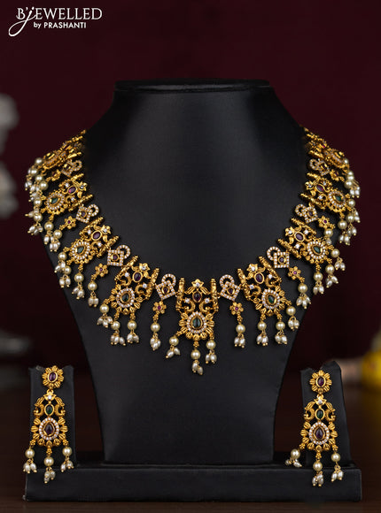 Antique guttapusalu necklace floral design with kemp & cz stones and pearl hangings