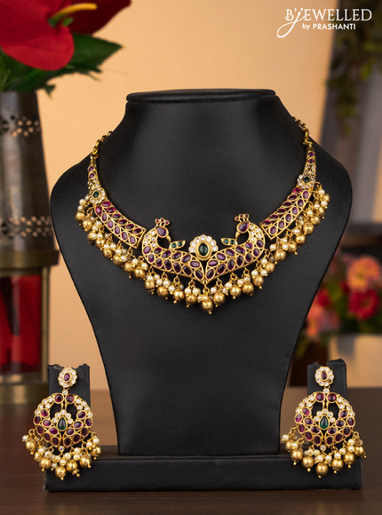 Antique necklace peacock design with kemp & cz stones and pearl & golden beads hanging