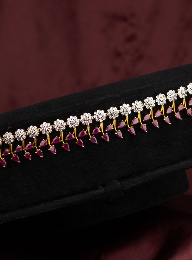 Antique hip chain with floral design and pink kemp & cz stones