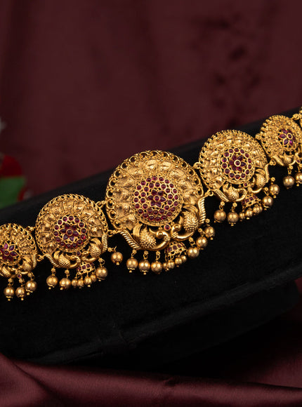 Antique hip chain peacock design with pink kemp stones and golden beads hanging