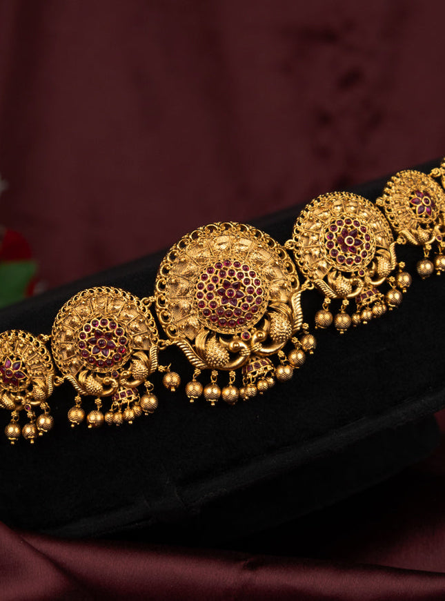 Antique hip chain peacock design with pink kemp stones and golden beads hanging