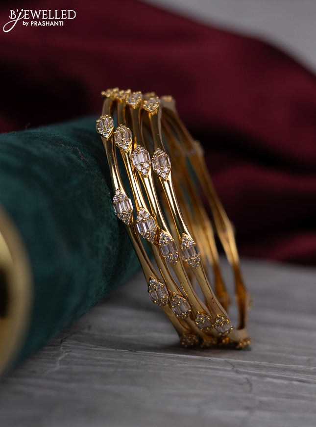 Zircon bangle with cz stones in gold finish