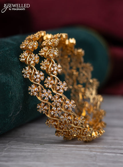 Zircon bangle with cz stones in gold finish