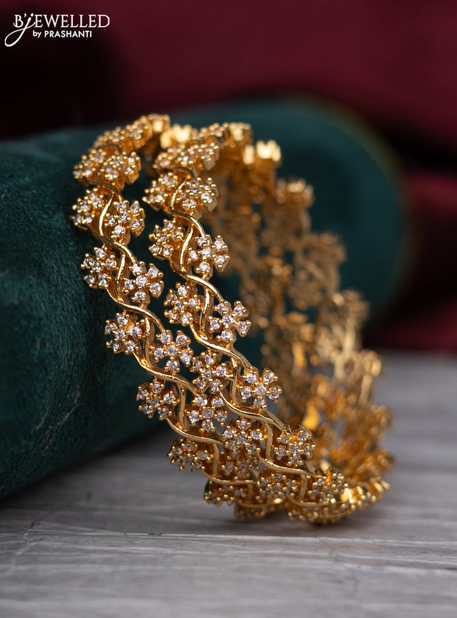 Zircon bangle with cz stones in gold finish