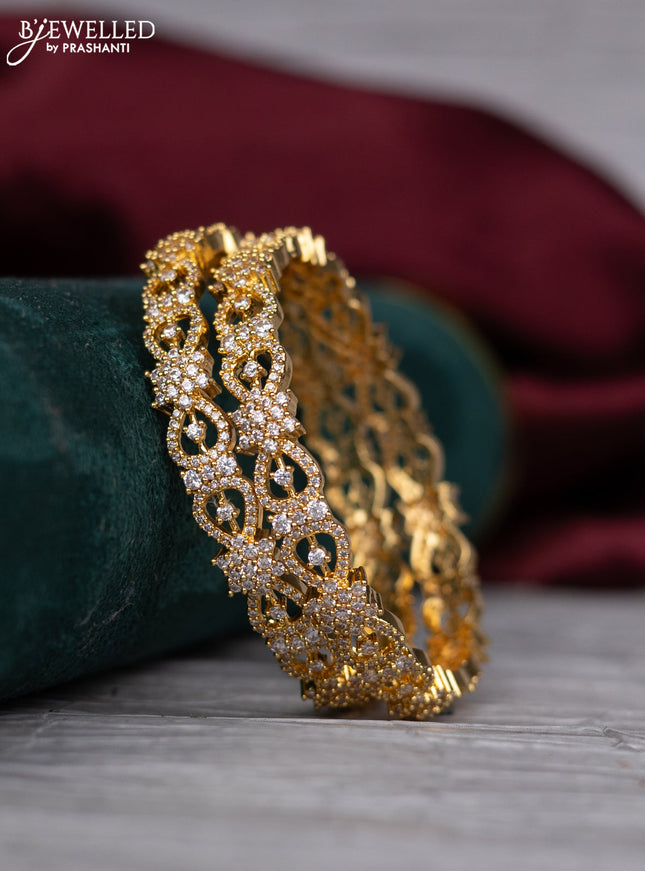 Zircon bangle with cz stones in gold finish