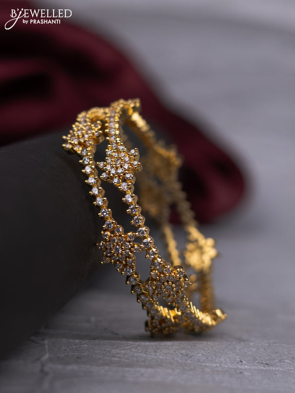 Zircon bangle with cz stones in gold finish