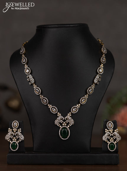 Necklace elephant design with emerald and cz stones in victorian finish