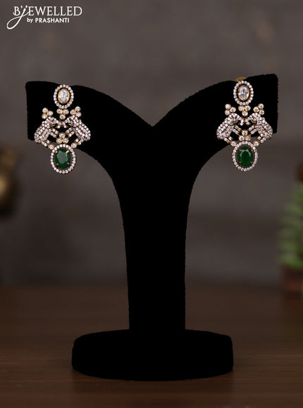 Necklace elephant design with emerald and cz stones in victorian finish