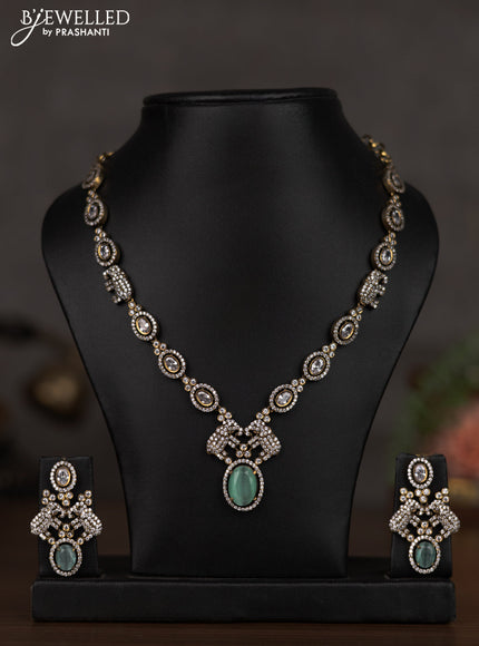 Necklace elephant design with mint green and cz stones in victorian finish