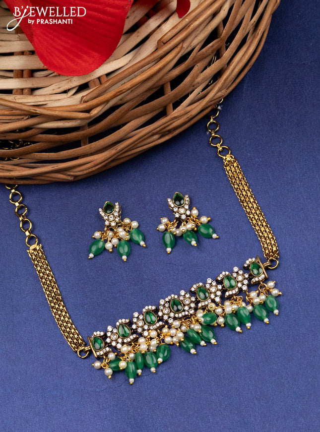 Victorian finish choker with emerald & cz stones and beads hanging
