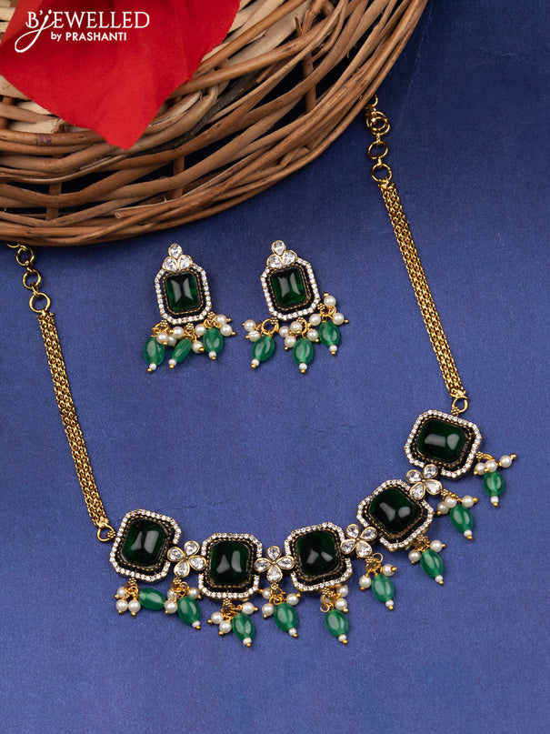 Victorian finish choker with emerald & kundan stones and beads hanging