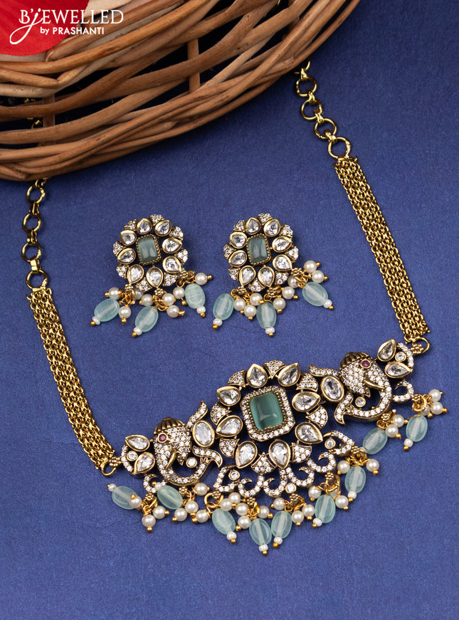 Victorian finish choker elephant design with mint green & cz stones and beads hanging