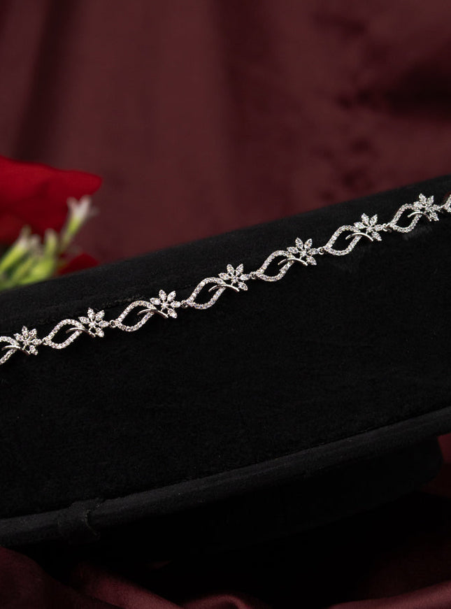 Zircon hip chain with floral design and cz stones