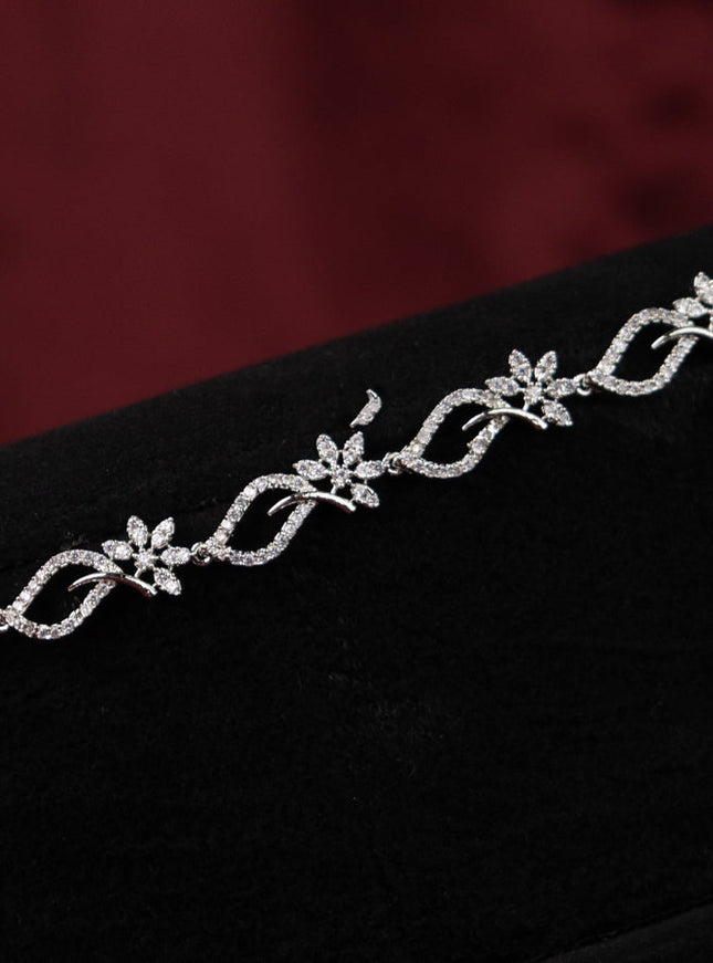 Zircon hip chain with floral design and cz stones
