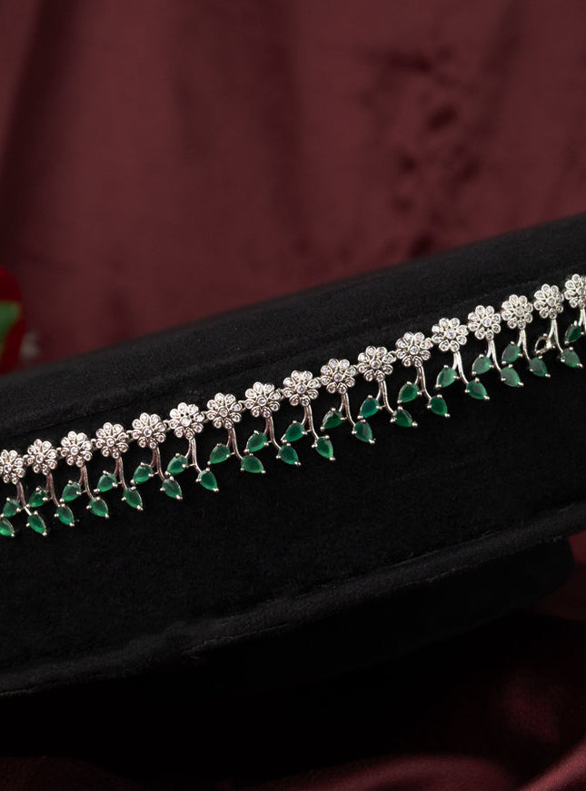 Zircon hip chain with floral design and emerald & cz stones