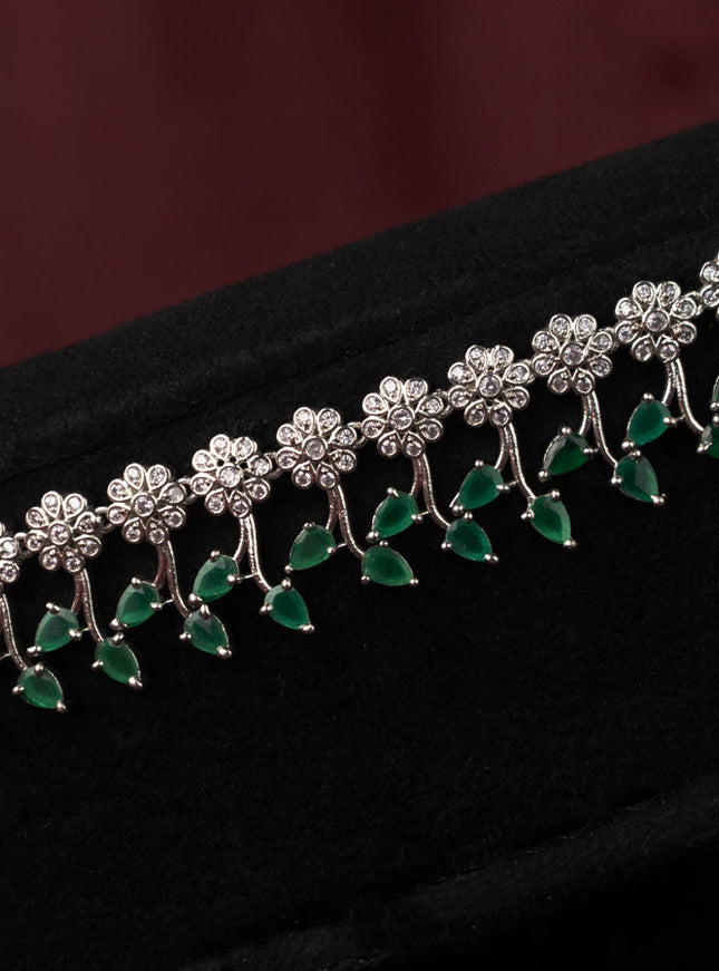 Zircon hip chain with floral design and emerald & cz stones