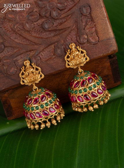 Antique jhumka lakshmi design with kemp stones and golden beads hangings