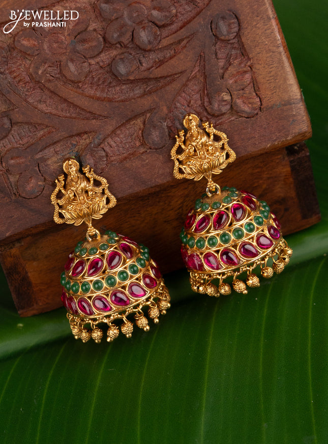 Antique jhumka lakshmi design with kemp stones and golden beads hangings