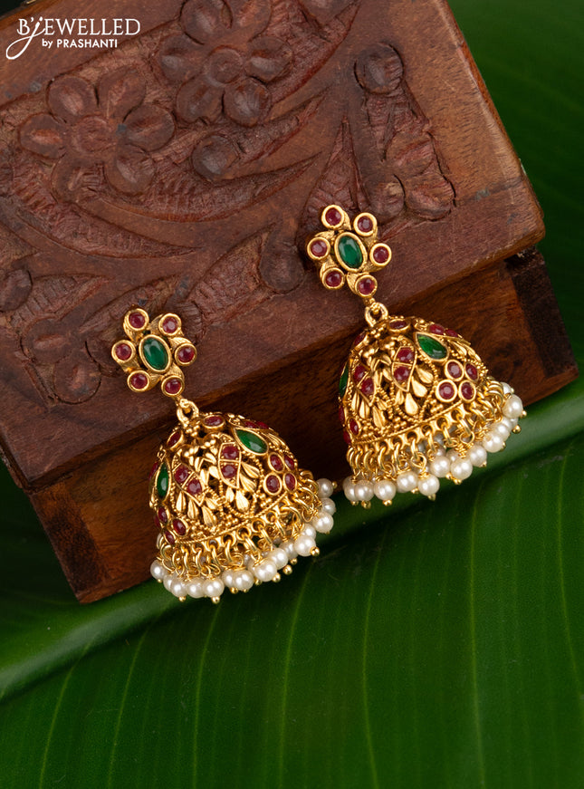 Antique jhumka peacock design with kemp stones and pearl hangings