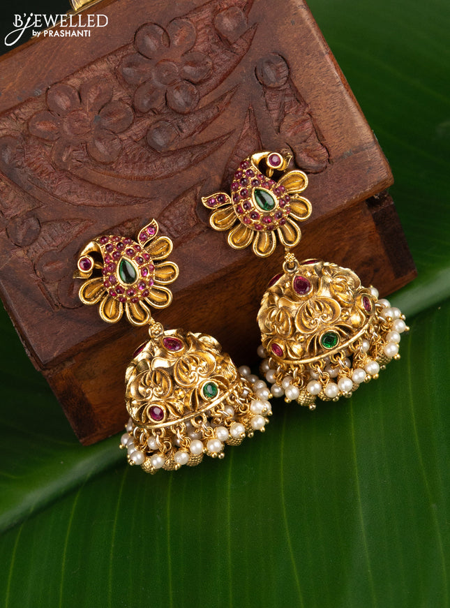 Antique jhumka peacock design with kemp stones and pearl hangings