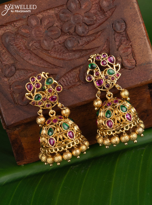 Antique jhumka peacock design with kemp stones and golden beads hangings