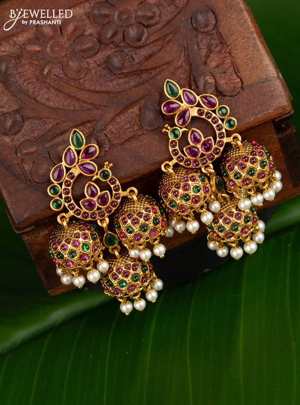 Antique jhumka peacock design with kemp stones and pearl hangings