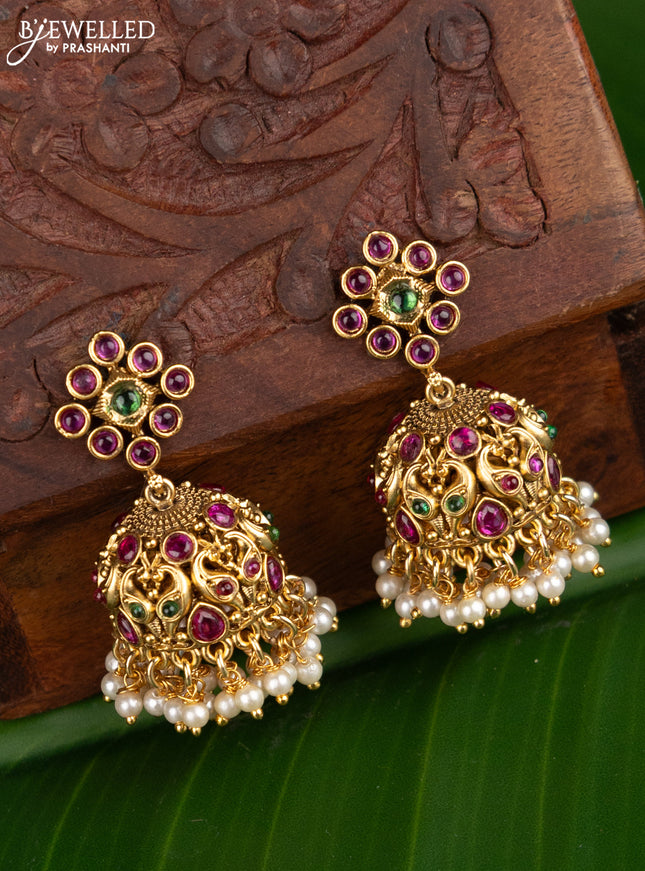 Antique jhumka peacock design with kemp stones and pearl hangings