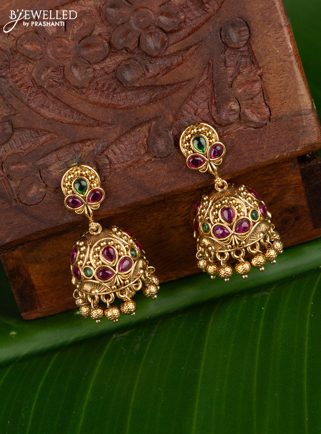Antique jhumka with kemp stones and golden beads hangings