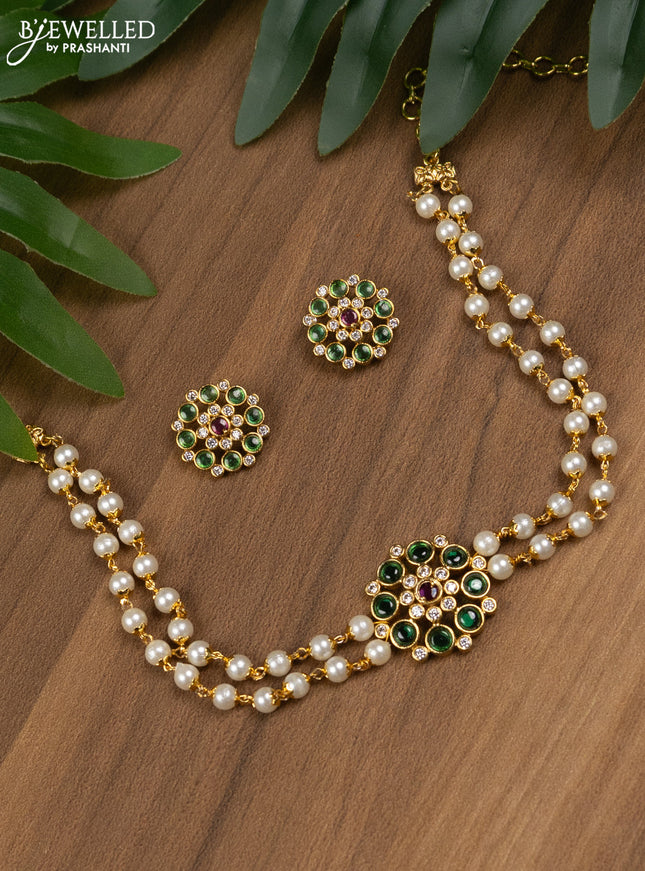 Pearl choker with kemp and cz stones