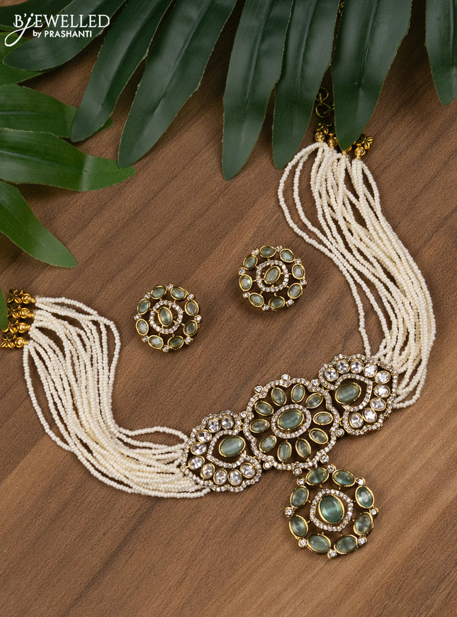 Pearl choker with mint green and cz stones