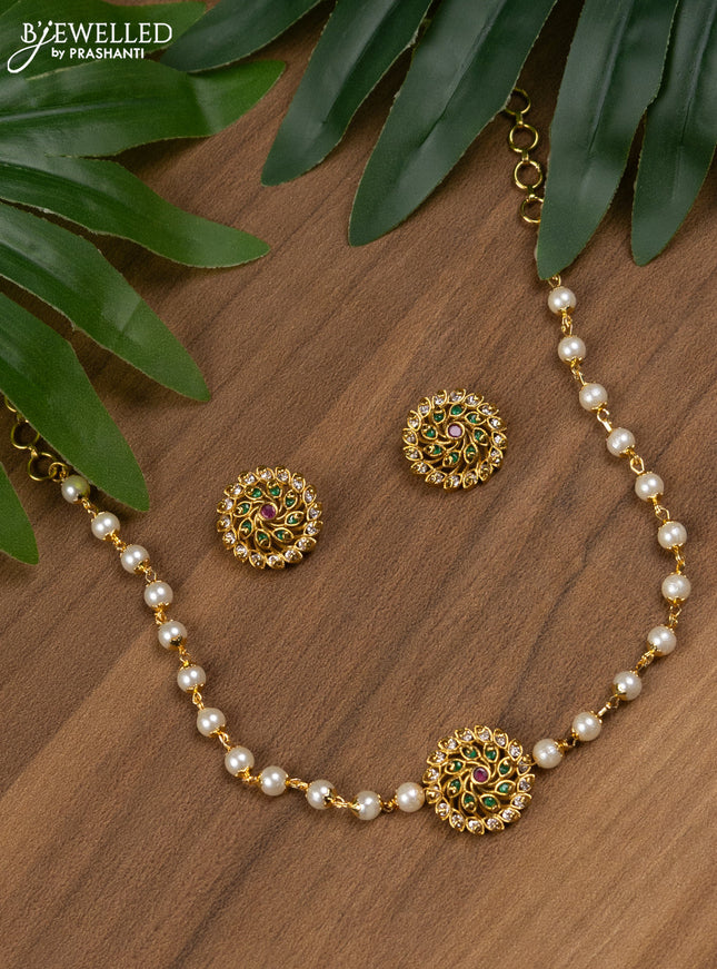 Pearl choker with kemp and cz stones