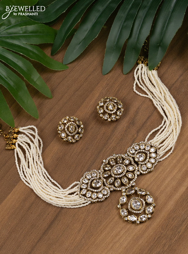 Pearl choker with cz stones