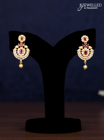 Zircon combo set floral design with ruby & cz stones and pearl hangings in golden finish