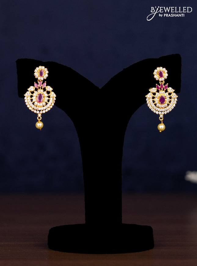Zircon combo set floral design with ruby & cz stones and pearl hangings in golden finish