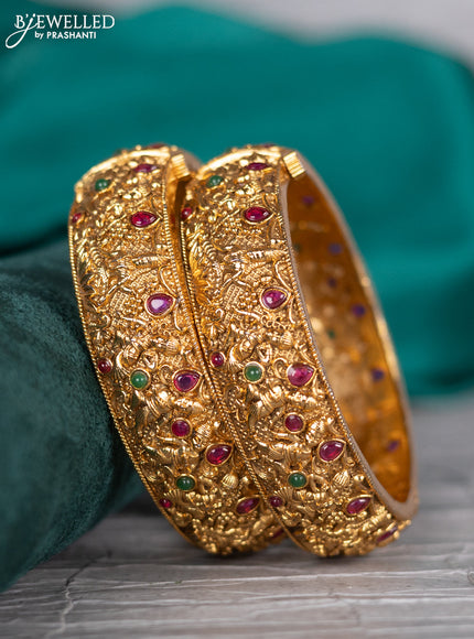 Antique screw type bangle lakshmi design with kemp stones