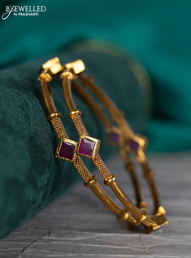 Antique bangle with pink kemp stones