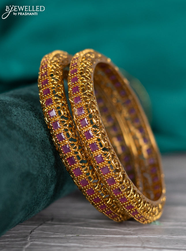 Antique bangle with pink kemp stones