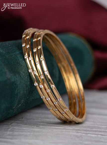 zircon bangle with cz stones in gold finish