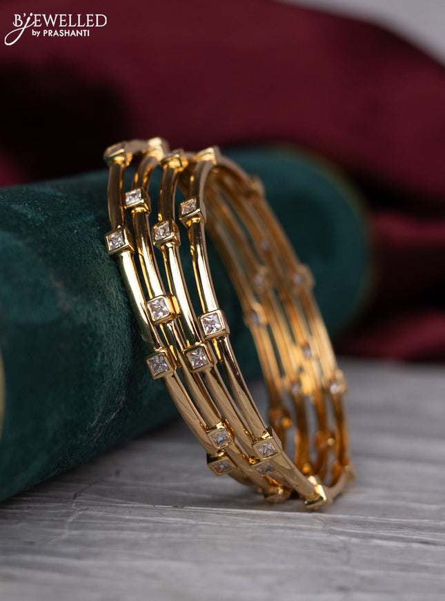 zircon bangle with cz stones in gold finish