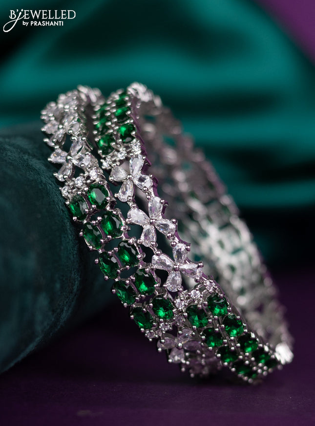 zircon bangle floral design with emerald and cz stones