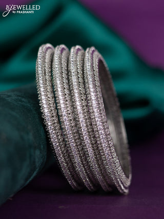 zircon bangle with cz stones