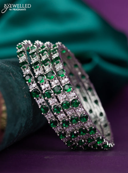 zircon bangle with emerald and cz stones