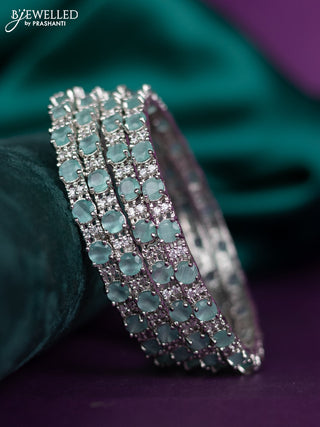 zircon bangle with mint green and cz stones