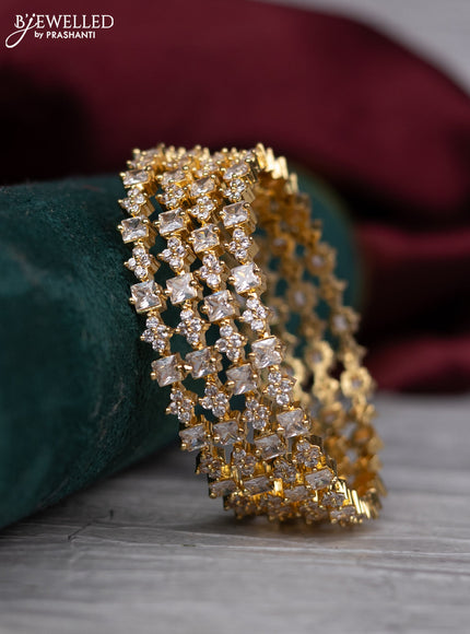 zircon bangle with gold finish and  cz stones
